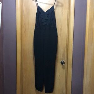 Black jumpsuit with ruffles